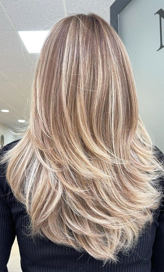 Blonde Highlights Collarbone Layers With Soft Waves — Trendy Blonde Hairstyles