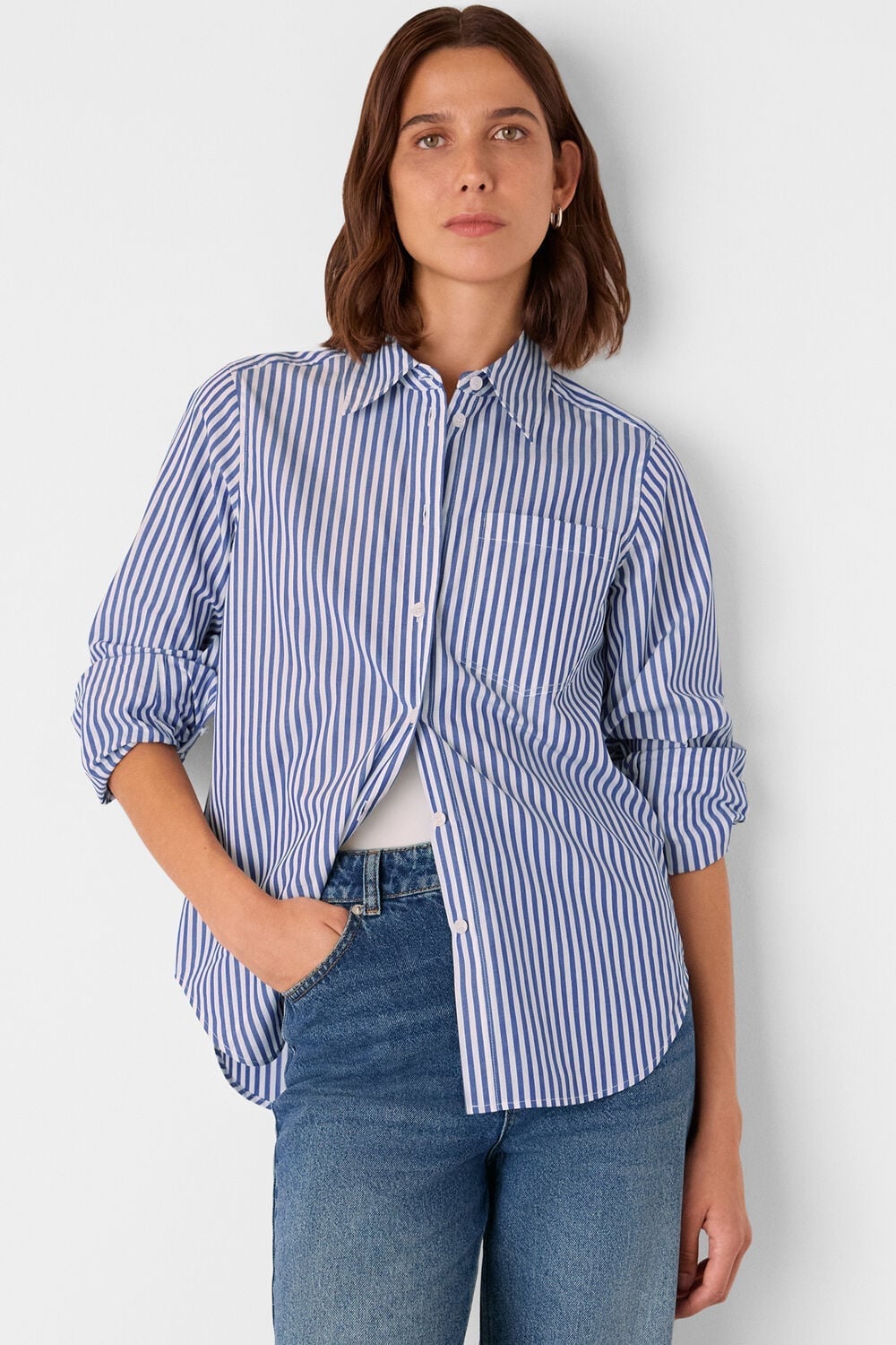 Blue and White Striped Cotton Shirt Over White T-Shirt Blue and White Striped Cotton Shirt Over White T-Shirt — Trendy Blue and White Outfits