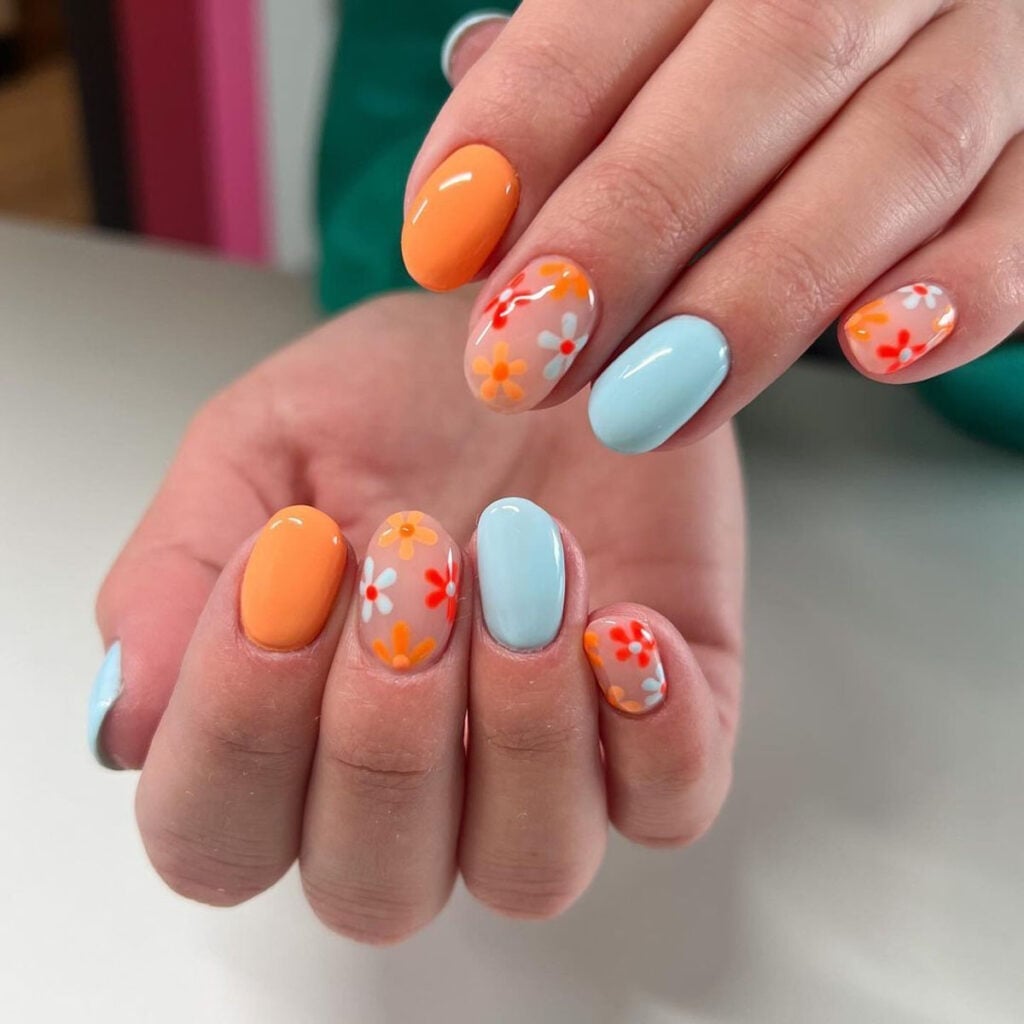 Short Oval Mixed Colors With Cheerful Florals Short Oval Mixed Colors With Cheerful Florals — Trendy Boho Nails
