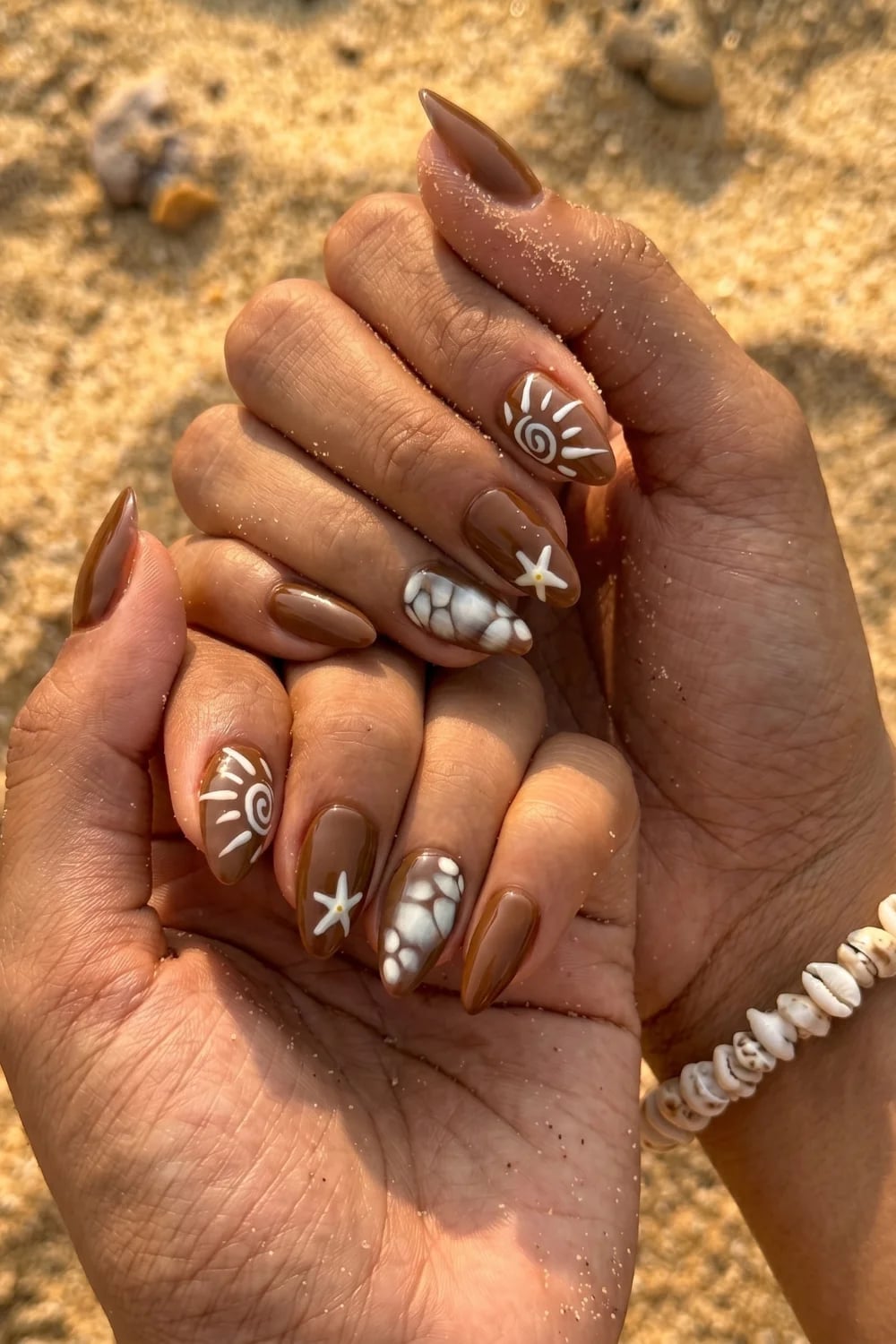 Medium Almond Brown With Themed Nail Art Medium Almond Brown With Themed Nail Art — Trendy Boho Nails