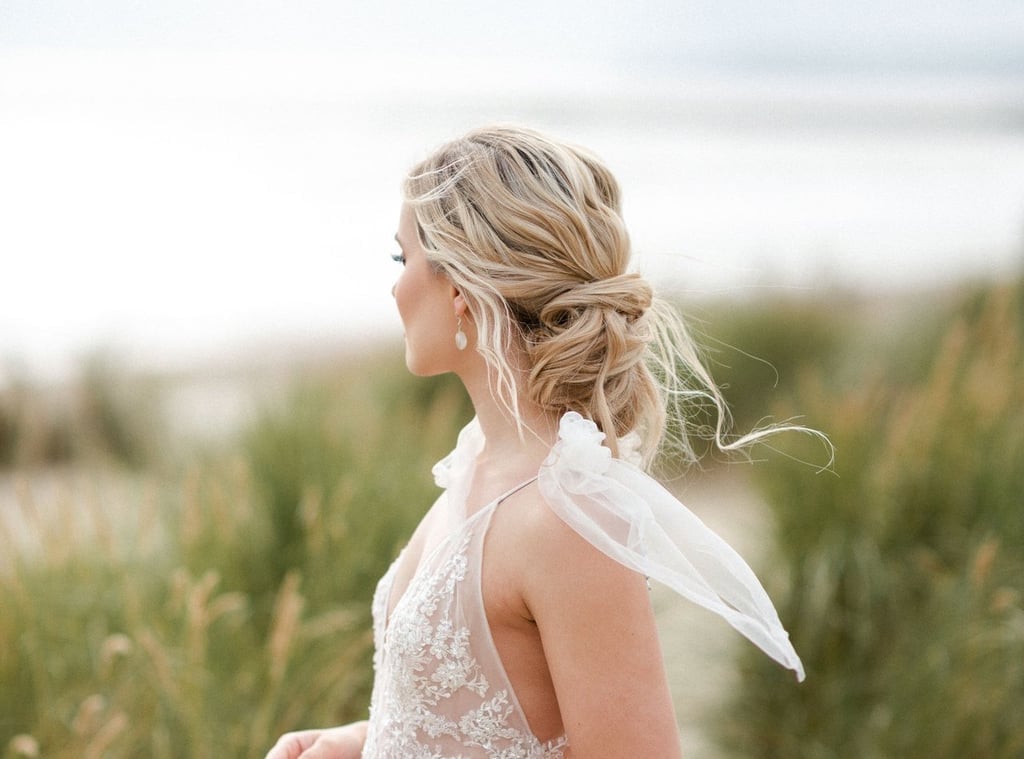 Blonde Low Bun With Soft Waves — Trendy Bridal Hairstyles