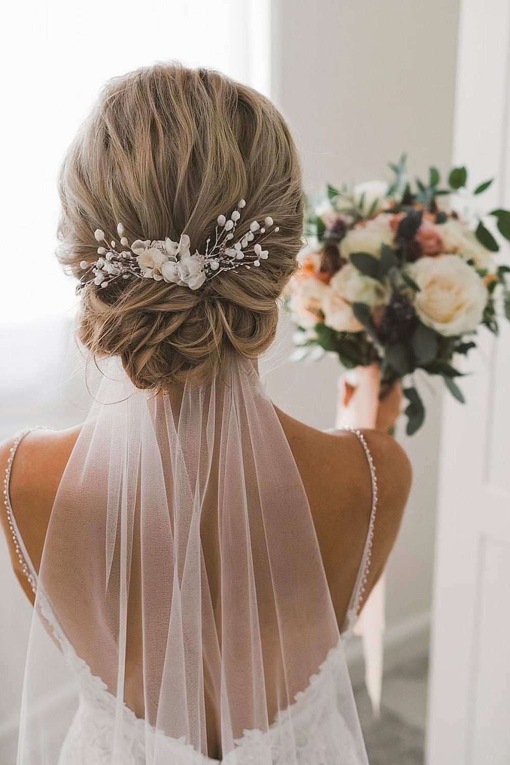 Intricate Blonde Updo With Accessory — Trendy Bridal Hairstyles