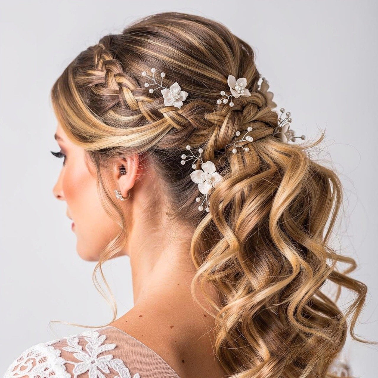 Side Swept Curls With Floral Pins — Trendy Bridal Hairstyles
