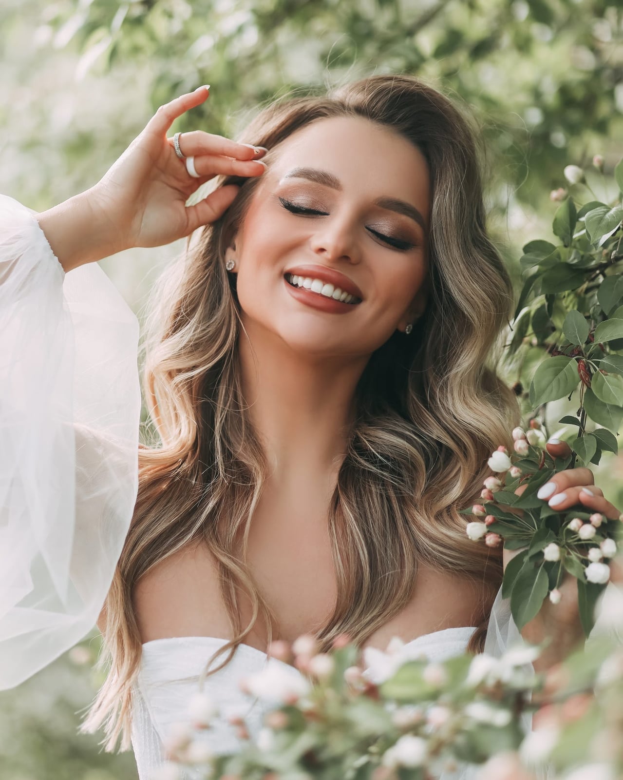 Ash Blonde Blowout With Curtain Bangs — Trendy Bridal Hairstyles