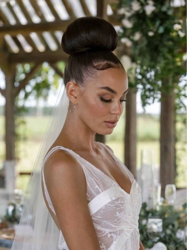 Sleek High Bun Dark Brown Hair — Trendy Bridal Hairstyles