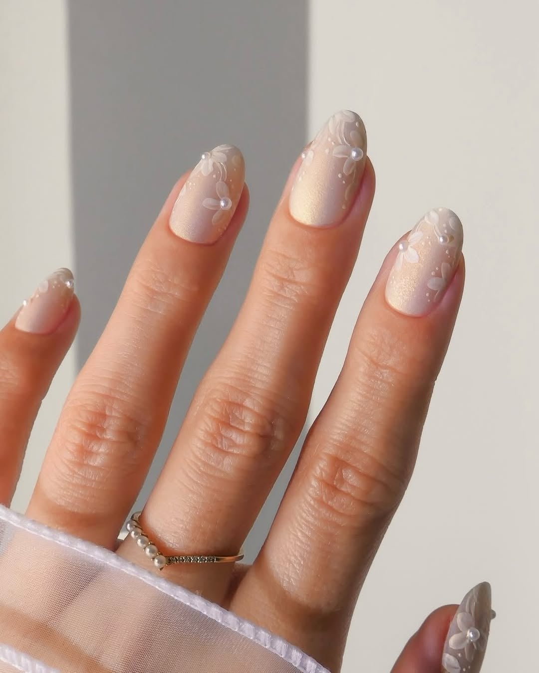 Creamy Golden Shimmer Almond Nails With Pearls Creamy Golden Shimmer Almond Nails With Pearls — Trendy Bride Nail