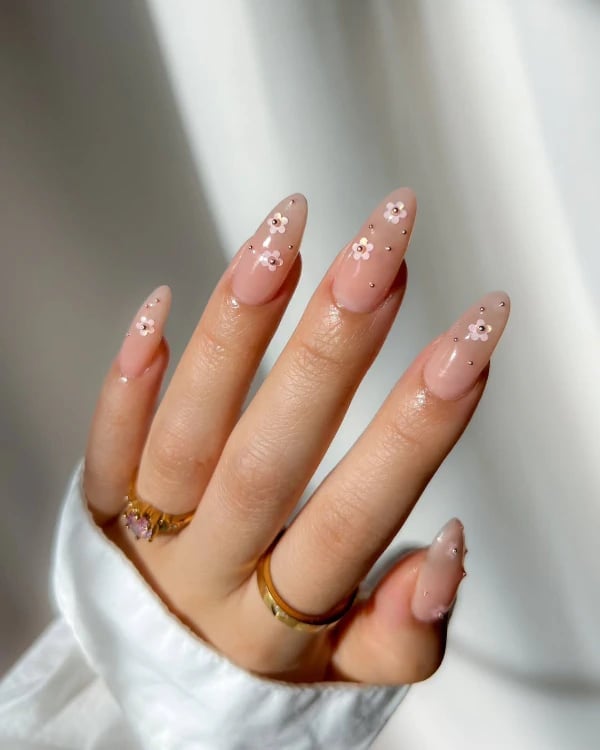 Sheer Pink Stiletto Nails With Floral Decals And Studs Sheer Pink Stiletto Nails With Floral Decals And Studs — Trendy Bride Nail