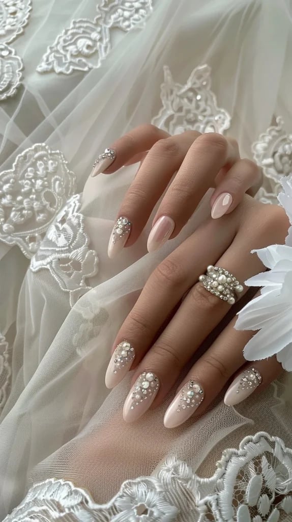 Rhinestone And Pearl Embellished Medium Almond Nails Rhinestone And Pearl Embellished Medium Almond Nails — Trendy Bride Nail