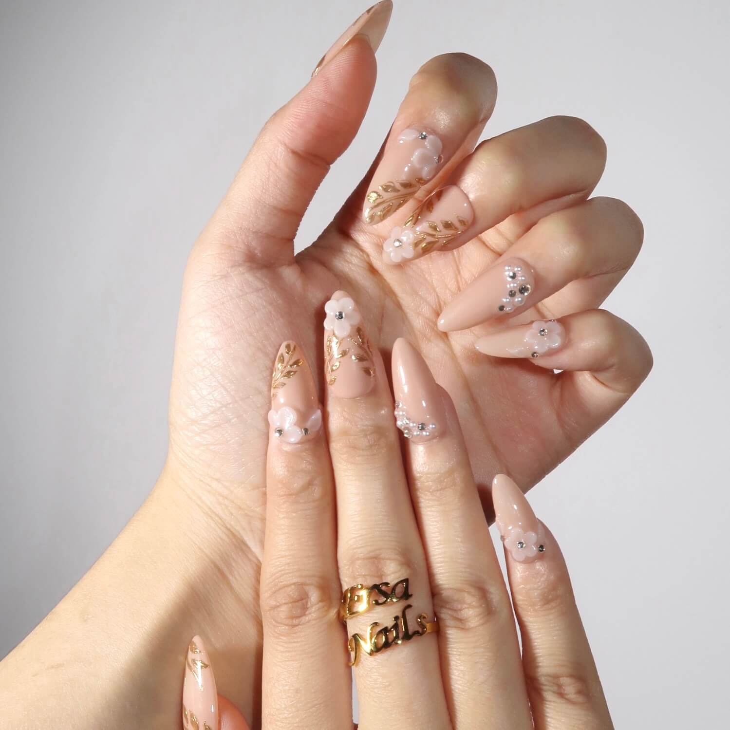 Nude Stiletto Nails With Gold Foil And 3D Flowers Nude Stiletto Nails With Gold Foil And 3D Flowers — Trendy Bride Nail