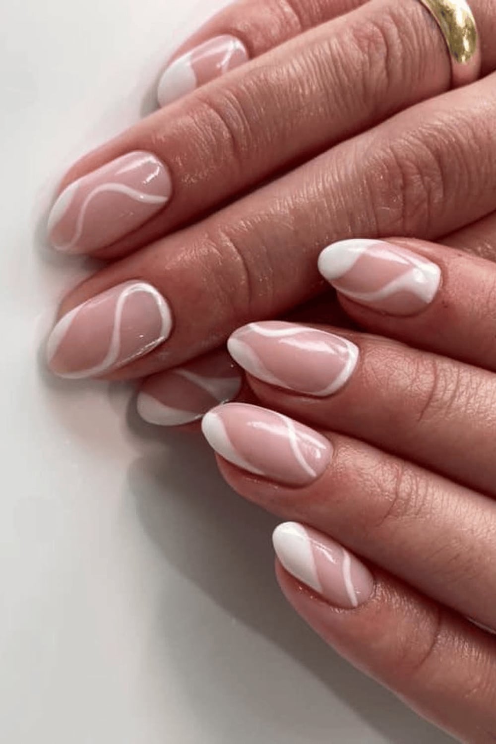 Pale Pink Oval Nails With White Abstract Swirls Pale Pink Oval Nails With White Abstract Swirls — Trendy Bride Nail