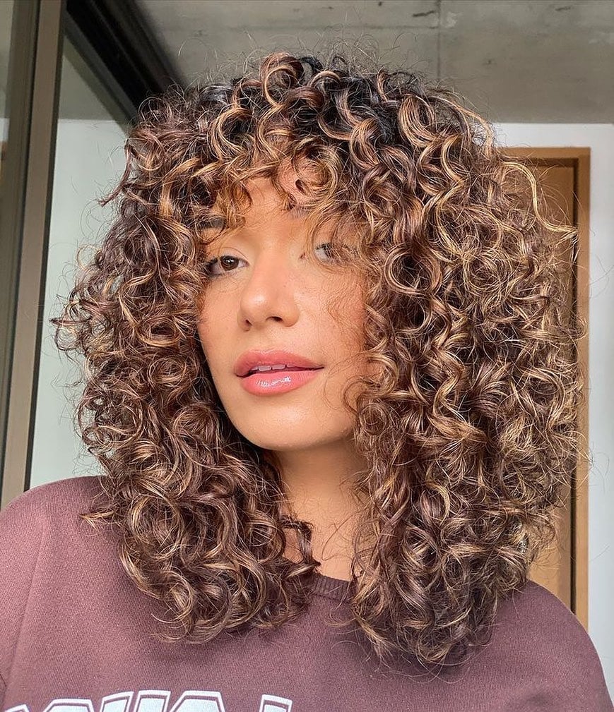Shoulder Length Dimensional Curls — Trendy Brown Curly Hair