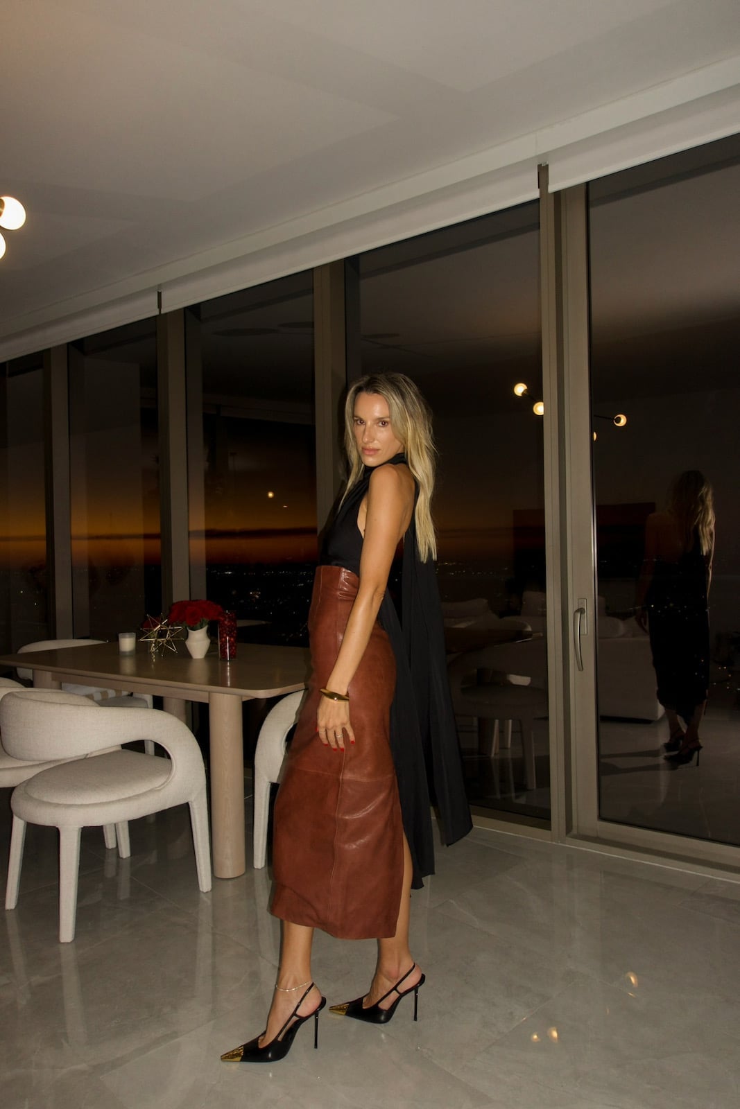 Glossy Pencil Skirt with Sleeveless Top and Black Pointed-Toe Heels Glossy Pencil Skirt with Sleeveless Top and Black Pointed-Toe Heels — Trendy Brown Leather Skirt Outfit