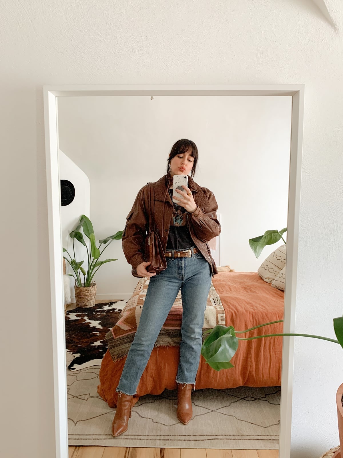 Brown Leather Jacket With Graphic Tee — Trendy Brown Suede Jacket Outfit