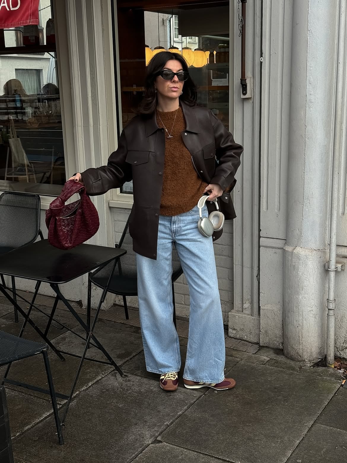 Brown Knit Sweater with Leather Jacket and Wide-Leg Jeans Brown Knit Sweater with Leather Jacket and Wide-Leg Jeans — Trendy Brown Sweater Outfit