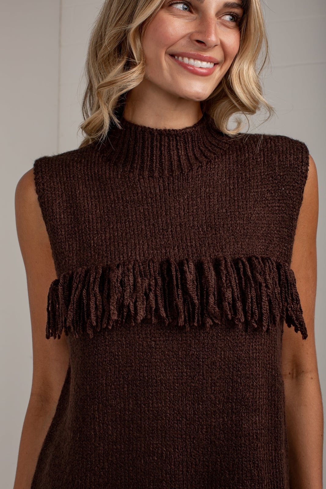 Dark Brown Sleeveless Mock Neck Sweater with Fringe Dark Brown Sleeveless Mock Neck Sweater with Fringe — Trendy Brown Sweater Outfit