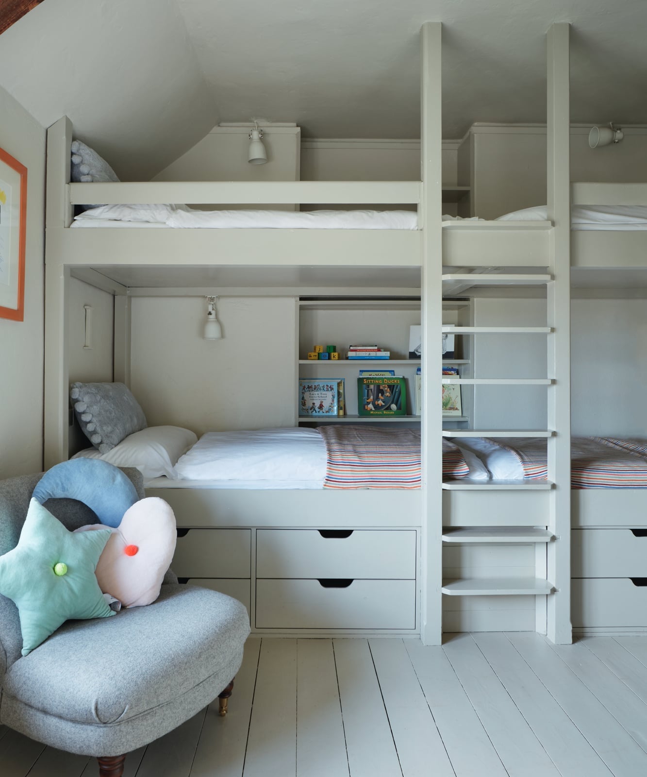 Neutral Built-In Bunk Bed with Pastel Accents and Decorative Pillows Neutral Built-In Bunk Bed with Pastel Accents and Decorative Pillows — Trendy Bunk Bed Ideas