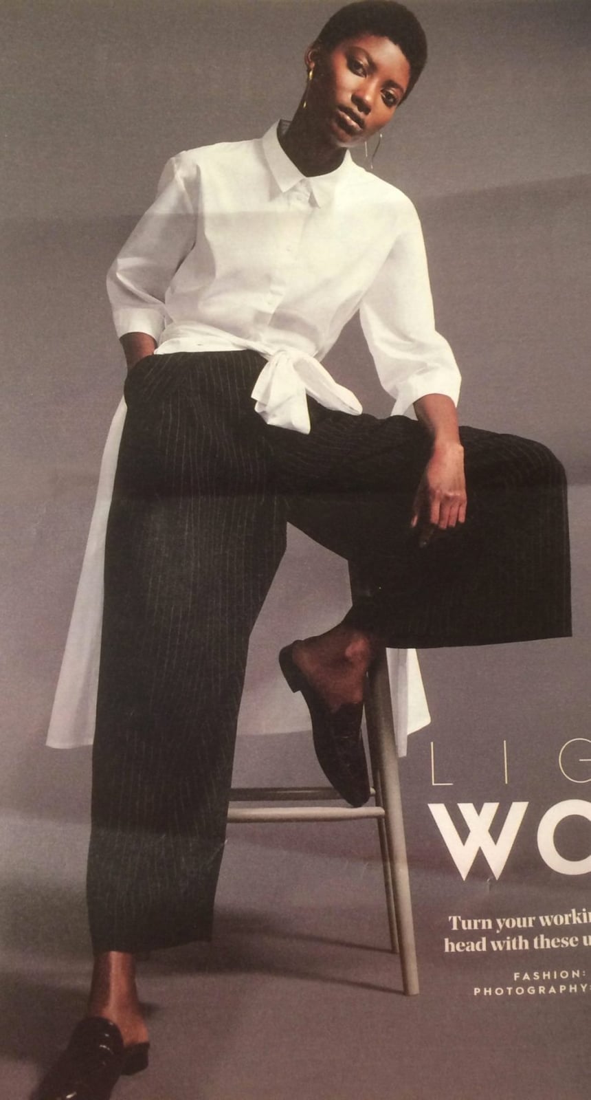 White Oversized Shirt with Tie Detail and Pinstripe Trousers — Trendy Business Casual Outfits Black Women