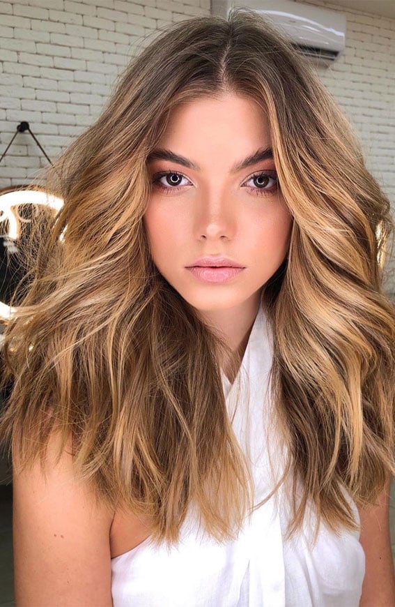 Mid-Back Caramel Tones With Subtle Highlights Mid-Back Caramel Tones With Subtle Highlights — Trendy Caramel Hair Color