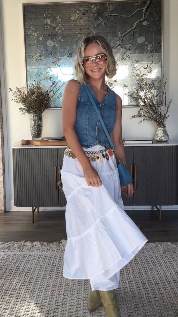 Blue Denim Vest Over White Top with Tiered Maxi Skirt and Coin Belt Blue Denim Vest Over White Top with Tiered Maxi Skirt and Coin Belt — Trendy Casual Concert Outfit