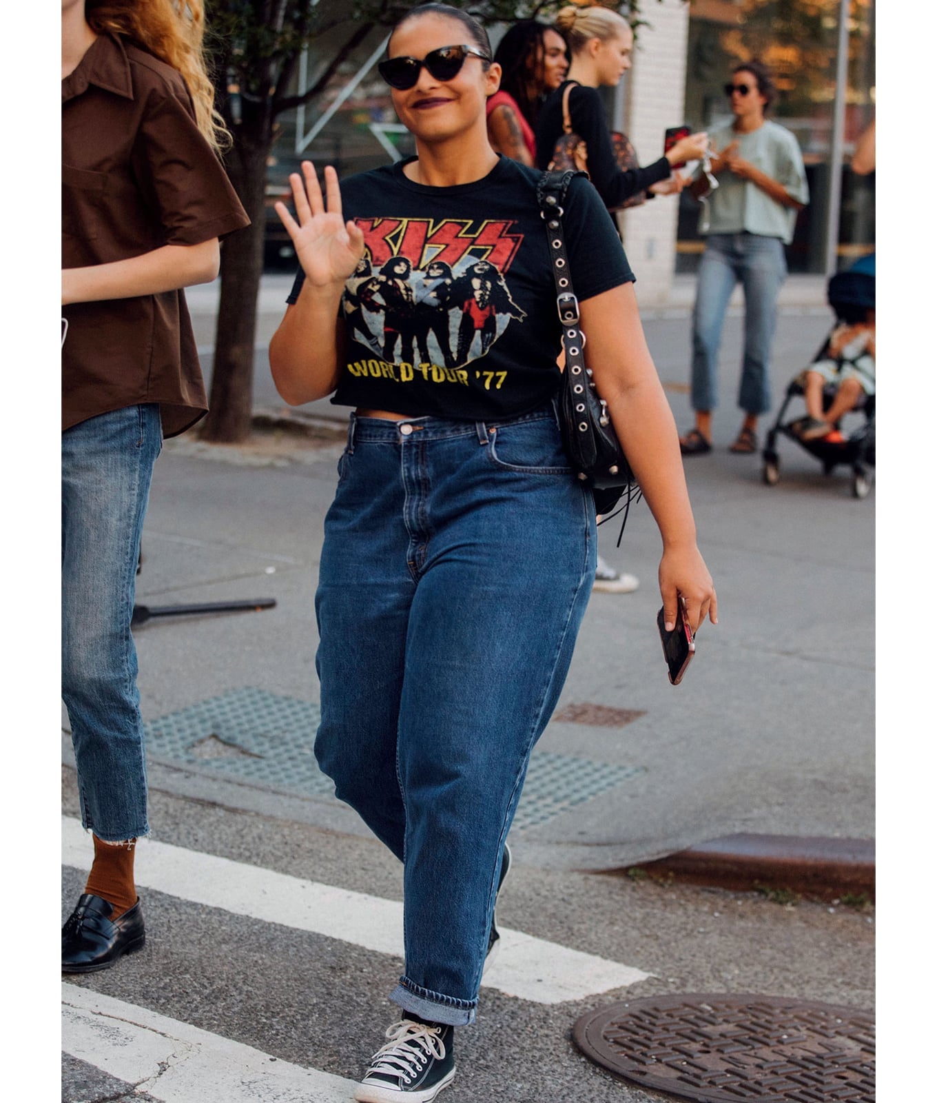 Black Band T-Shirt with Baggy Blue Denim Jeans and Canvas Sneakers Black Band T-Shirt with Baggy Blue Denim Jeans and Canvas Sneakers — Trendy Casual Concert Outfit