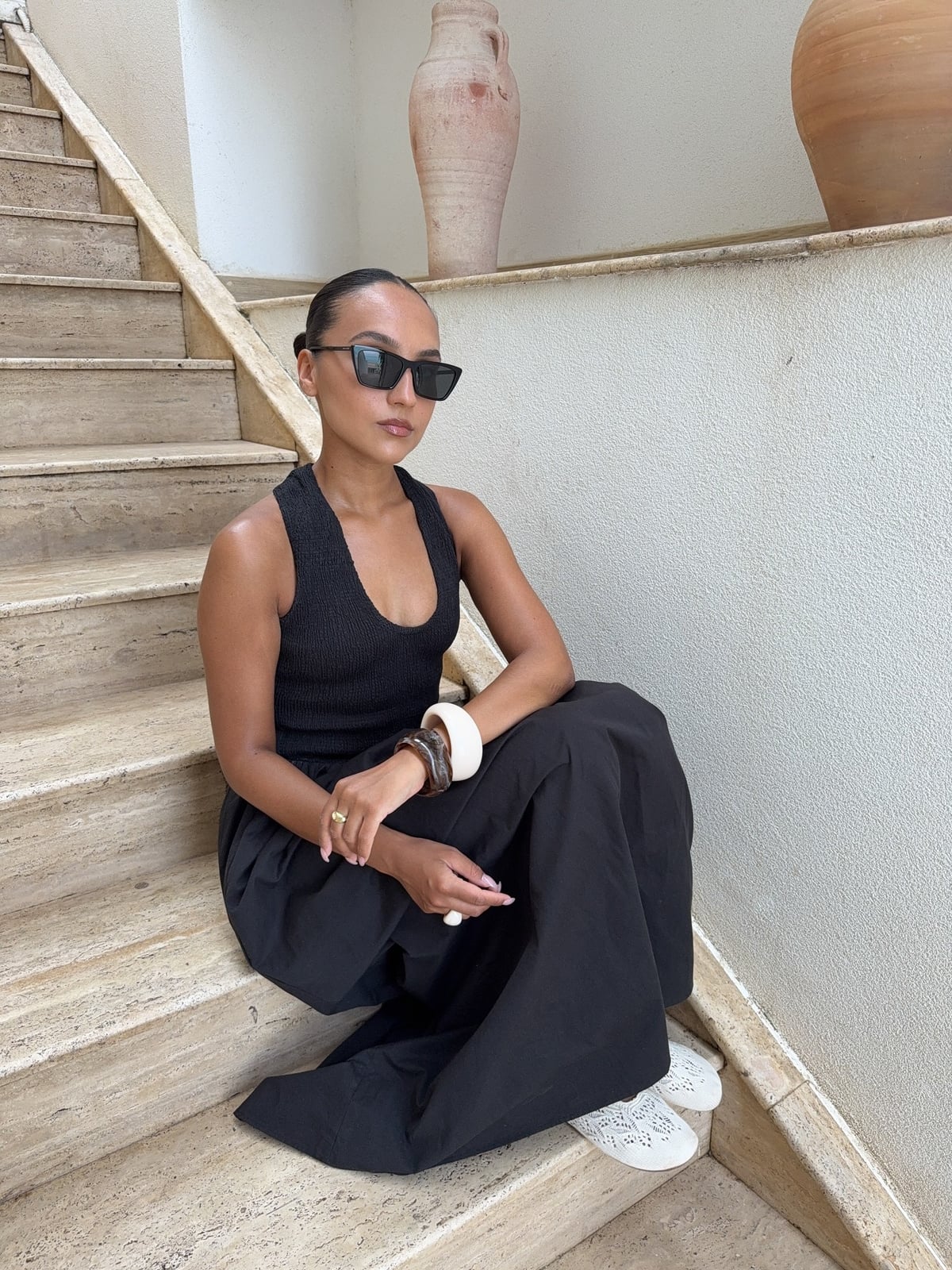 Black Knit Halter Top with Wide-Leg Trousers Black Knit Halter Top with Wide-Leg Trousers — Trendy Casual Dinner Outfit