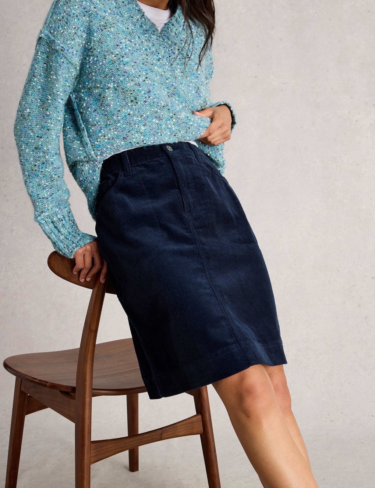 Navy Corduroy A-Line Skirt with Speckled Knit Sweater — Trendy Corduroy Skirt Outfit