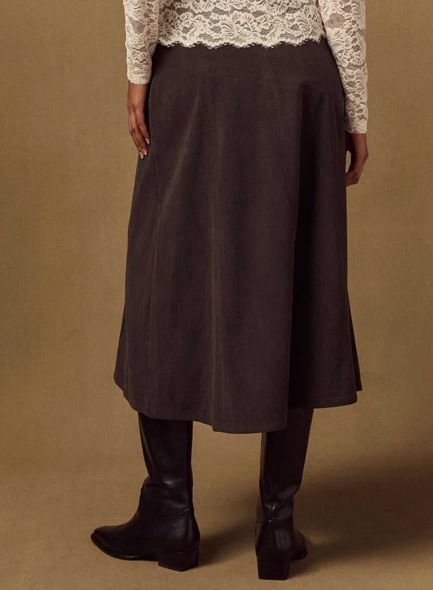 Dark Brown Corduroy A-Line Skirt with Lace Top and Leather Boots — Trendy Corduroy Skirt Outfit