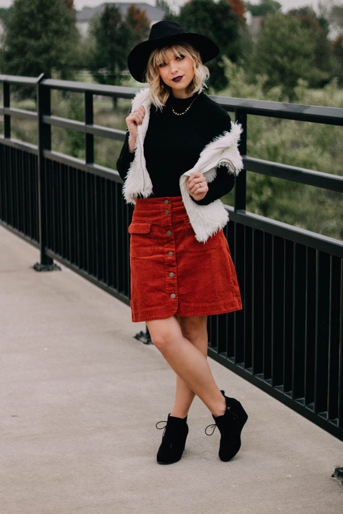 Burnt Orange Corduroy Skirt with Faux Fur Vest and Fedora — Trendy Corduroy Skirt Outfit
