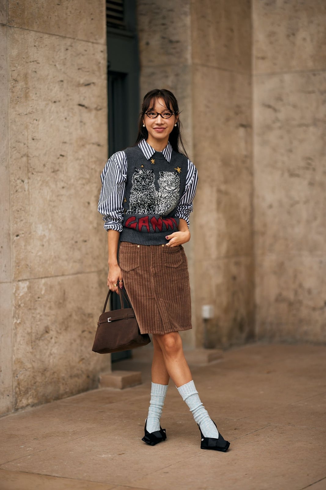 Brown Corduroy A-Line Skirt with Striped Shirt and Tiger Vest — Trendy Corduroy Skirt Outfit