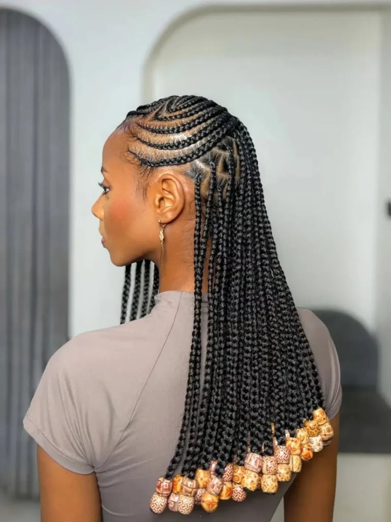 Mid-Back Cornrows With Beads And Curved Pattern Mid-Back Cornrows With Beads And Curved Pattern — Trendy Cornrows Braids for Black Women