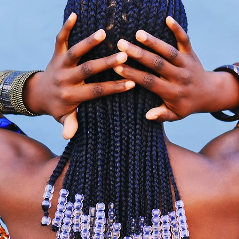 Mid-Back Cornrows With Beads And Curved Design, Everyday Version Mid-Back Cornrows With Beads And Curved Design, Everyday Version — Trendy Cornrows Braids for Black Women