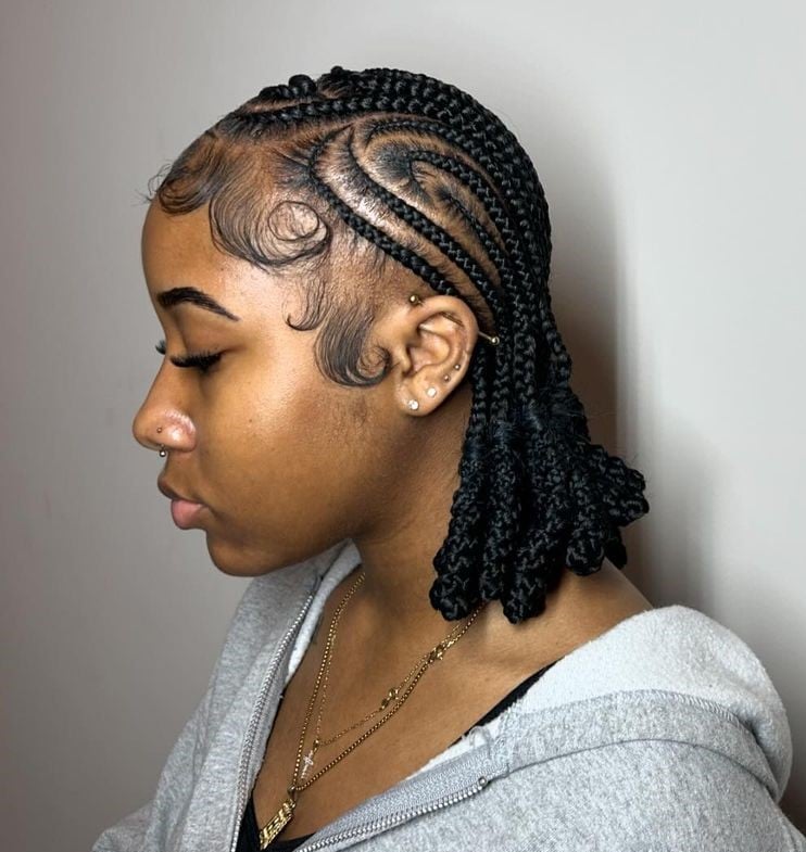 Shoulder Length Cornrows With Curved Patterns Shoulder Length Cornrows With Curved Patterns — Trendy Cornrows Braids for Black Women