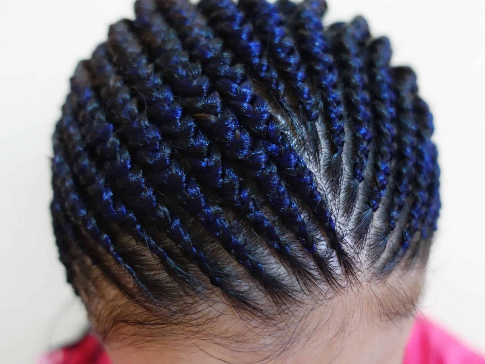 Cornrows With Vibrant Blue Highlights — Trendy Cornrows Hairstyles for Black Women