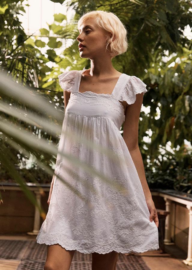 White Embroidered Cotton Dress with Empire Waist White Embroidered Cotton Dress with Empire Waist — Trendy Cottagecore Outfits