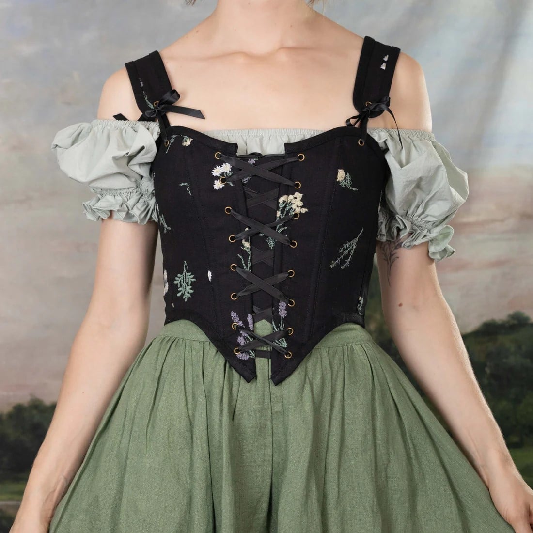 Black Embroidered Corset Over Pale Green Puff-Sleeve Top with Linen Black Embroidered Corset Over Pale Green Puff-Sleeve Top with Linen — Trendy Cottagecore Outfits