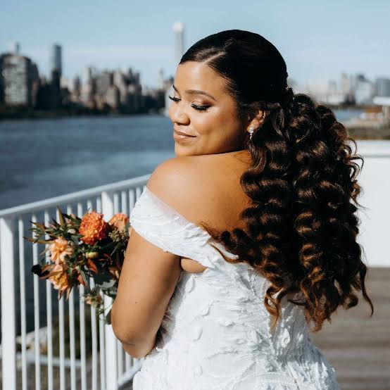 Mid-Back Length Layers With Subtle Highlights and Side Swept Bangs Mid-Back Length Layers With Subtle Highlights and Side Swept Bangs — Trendy Curly Hair Natural