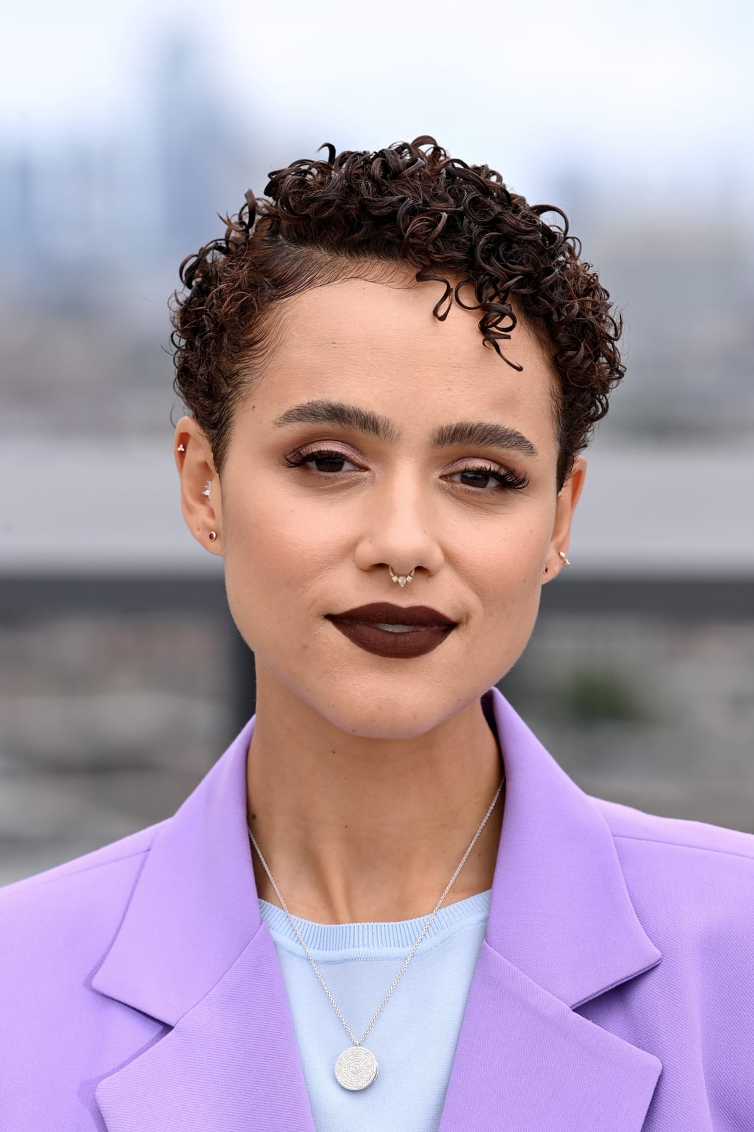 Short Dark Brown Pixie Cut With Subtle Highlights Short Dark Brown Pixie Cut With Subtle Highlights — Trendy Curly Hair Natural