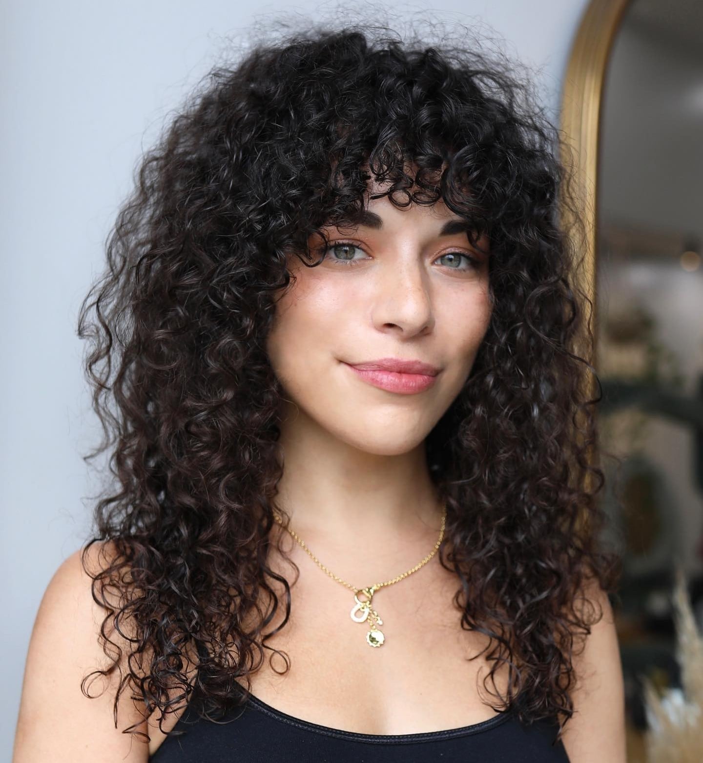Mid-Back Curls With Lighter Brown Highlights — Trendy Curly Hair Products