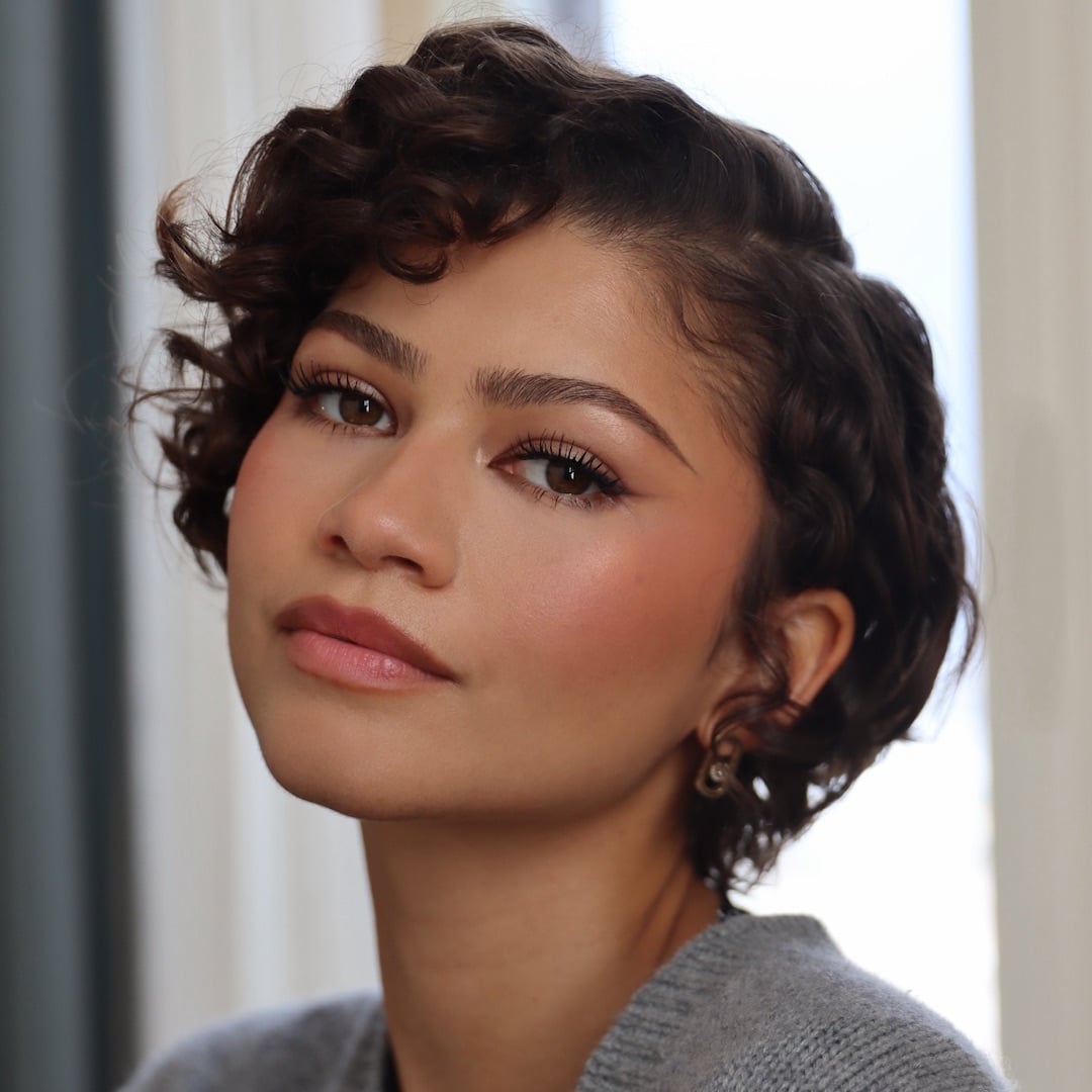 Shoulder Length Layers With Glossy Curls — Trendy Curly Hair Products
