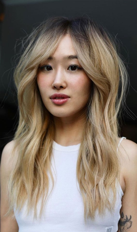 Collarbone Layered Bob With Wispy Curtain Bangs And Blonde Balayage Collarbone Layered Bob With Wispy Curtain Bangs And Blonde Balayage — Trendy Cutting Bangs