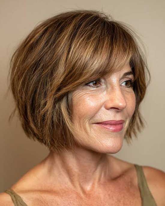 Ear Length Layered Bob With Side-Swept Bangs Ear Length Layered Bob With Side-Swept Bangs — Trendy Cutting Bangs