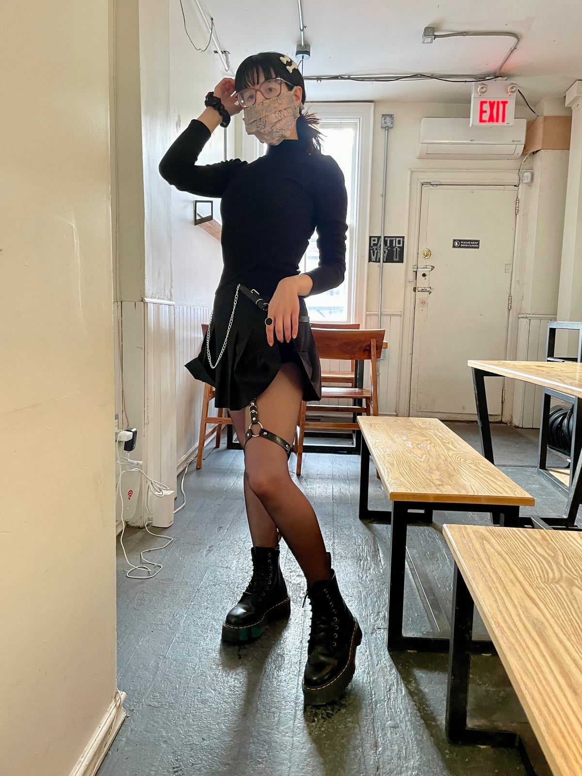 Platform Combat Boots With Flared Mini Skirt and Fitted Top — Trendy Doc Martens Outfits
