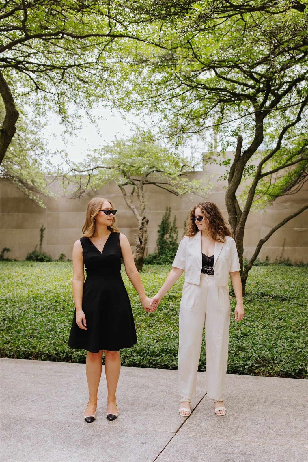 Cropped Jacket Over Black Dress with Wide-Leg Trousers Cropped Jacket Over Black Dress with Wide-Leg Trousers — Trendy Engagement Photos Outfits