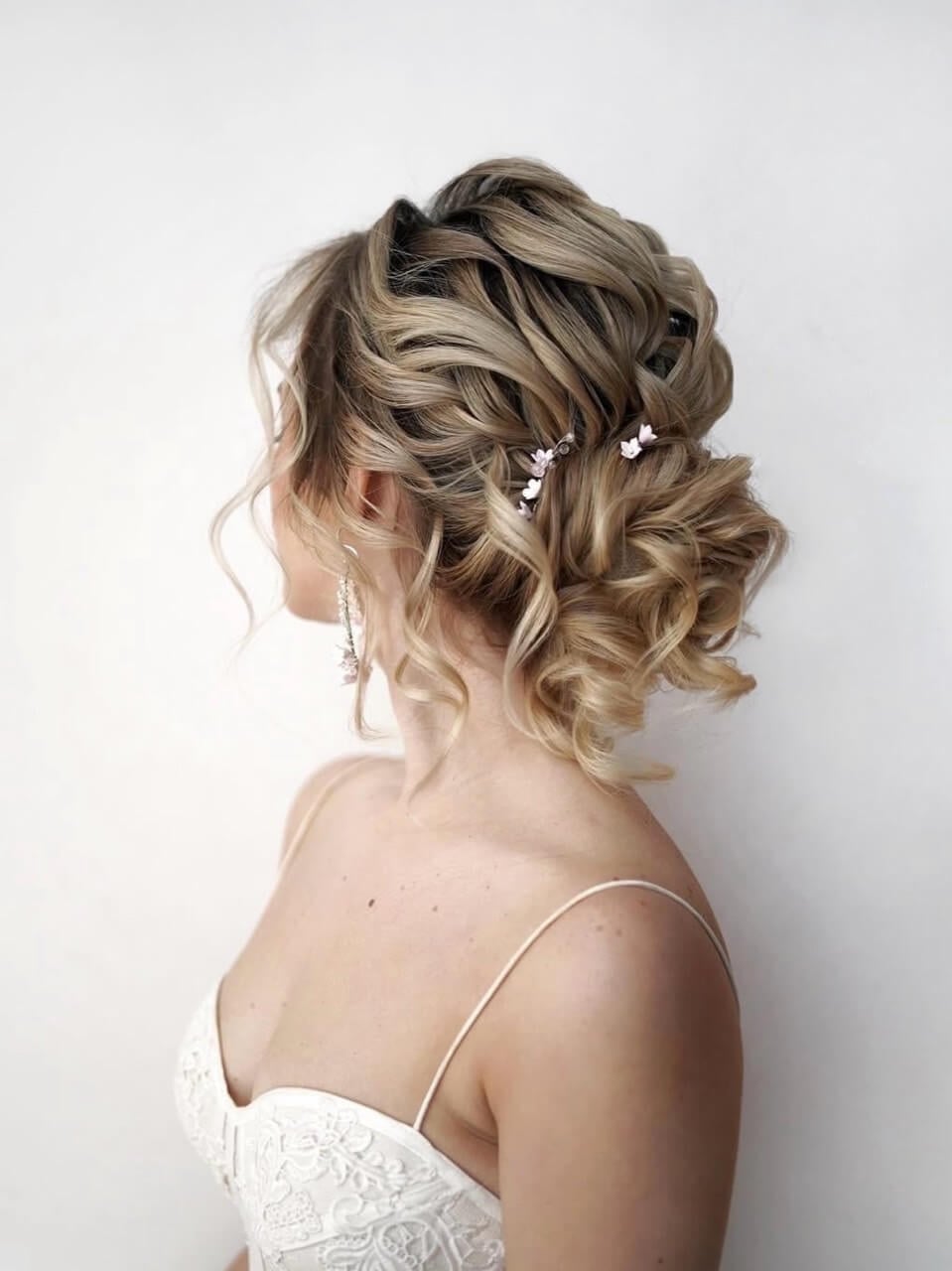 Voluminous Blonde Updo With Face Framing Curls Voluminous Blonde Updo With Face Framing Curls — Trendy Formal Updos