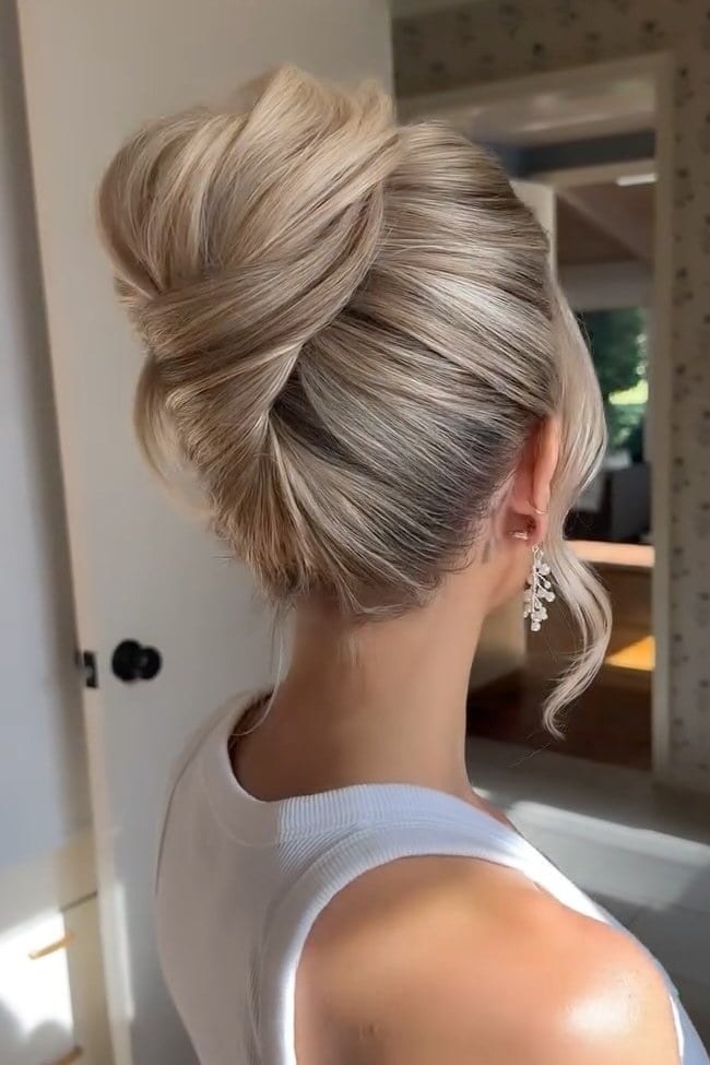 Voluminous French Twist In Ash Blonde Voluminous French Twist In Ash Blonde — Trendy Formal Updos