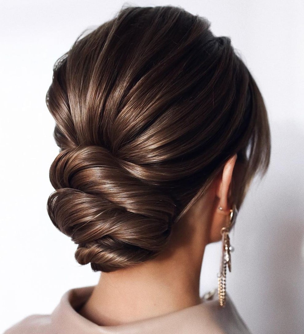 Sleek Dark Brown Twisted Bun Sleek Dark Brown Twisted Bun — Trendy Going Out Hairstyles