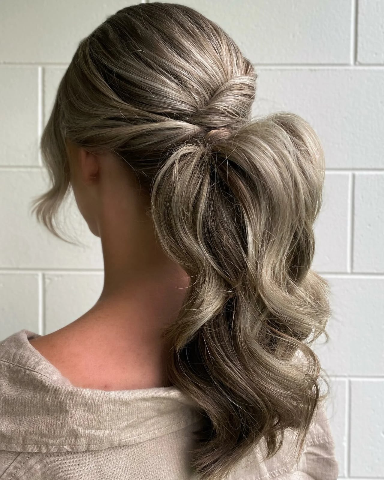 Low Ponytail With Twisted Detail Low Ponytail With Twisted Detail — Trendy Going Out Hairstyles