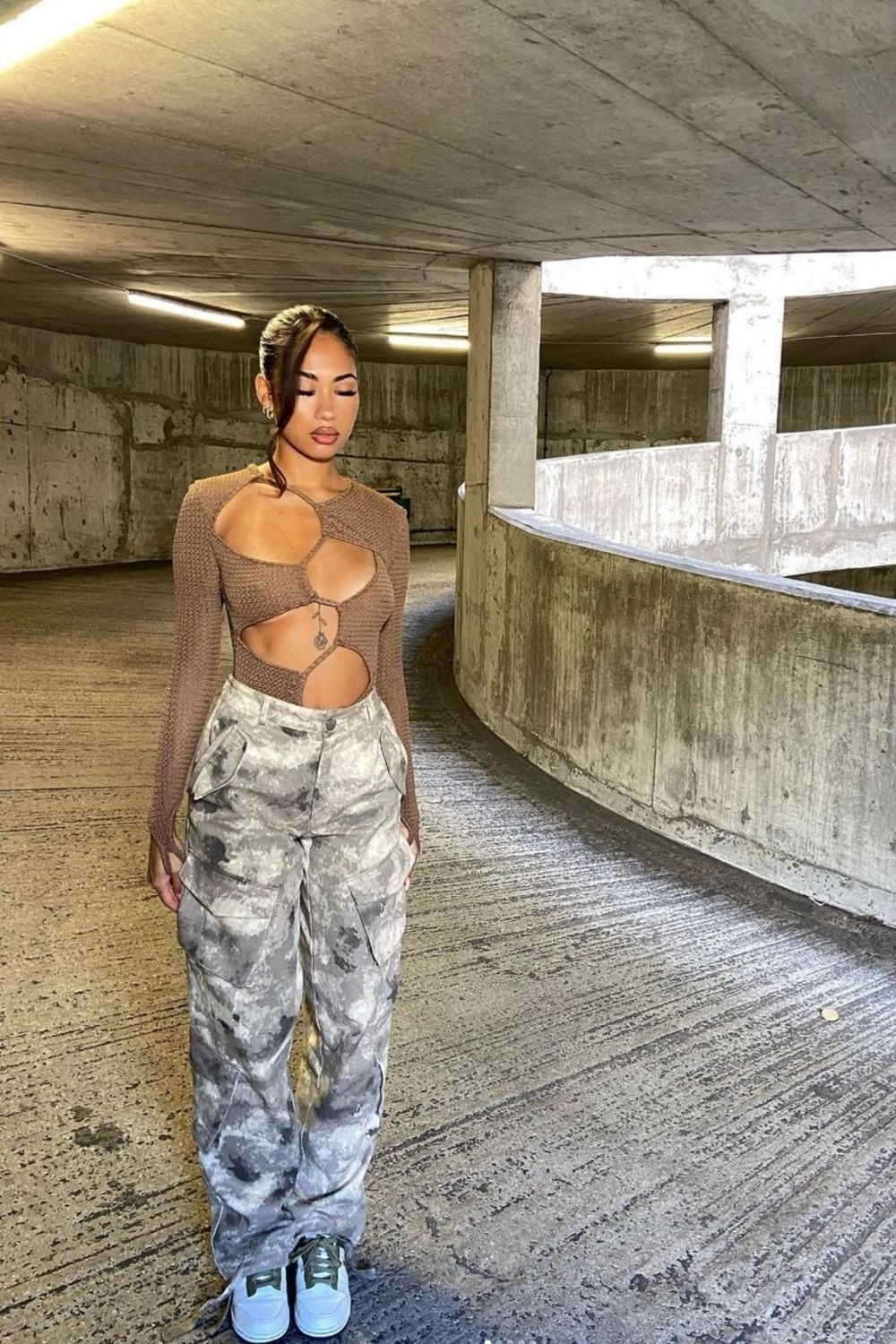 Brown Cut-Out Knit Top With Cargo Pants — Trendy Going Out Outfits Night Club
