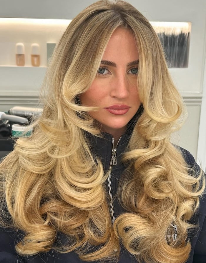 Mid-Back Golden Blonde With Root Shadow — Trendy Golden Blonde