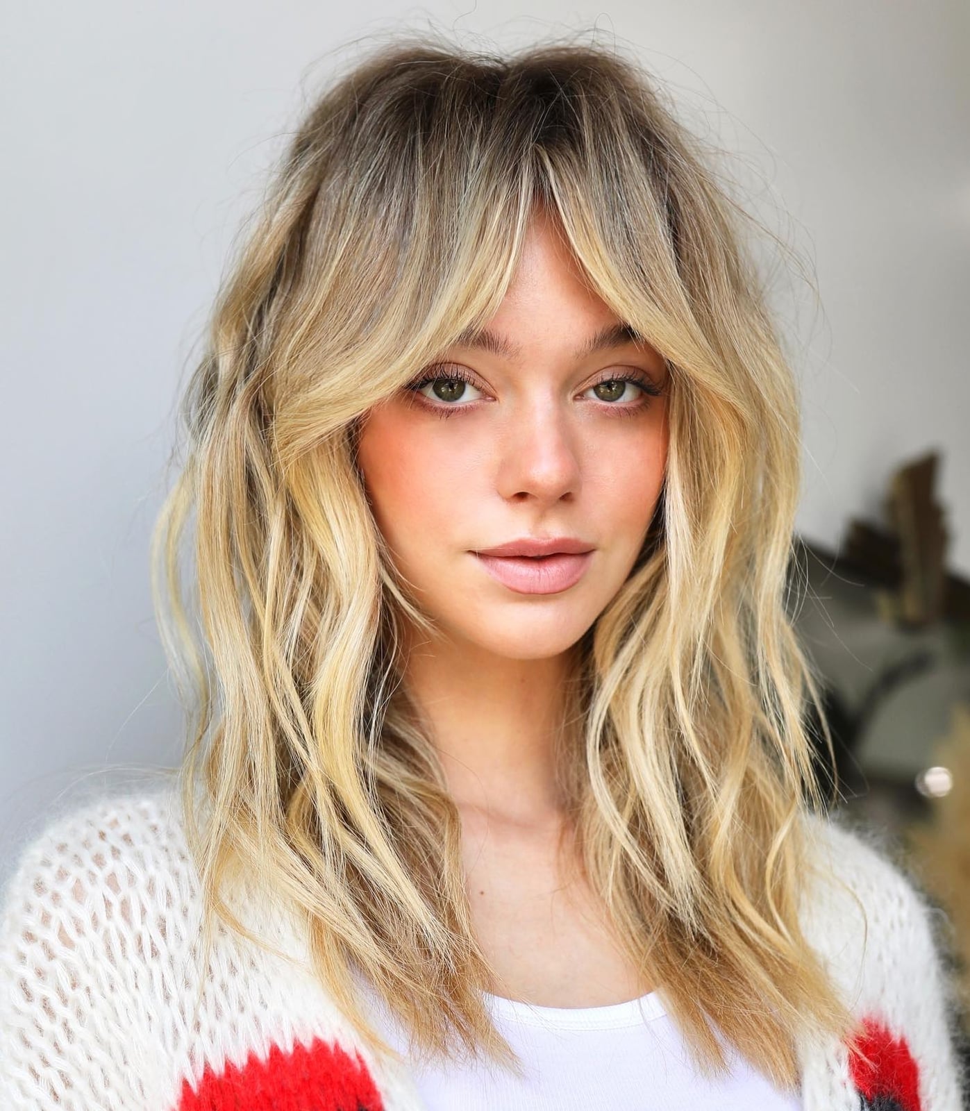 Mid-Back Light Golden Blonde With Curtain Bangs — Trendy Golden Blonde